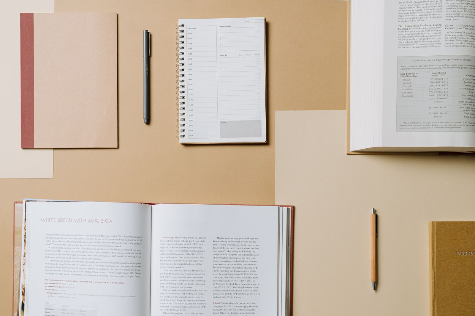 Books and notebooks on a table